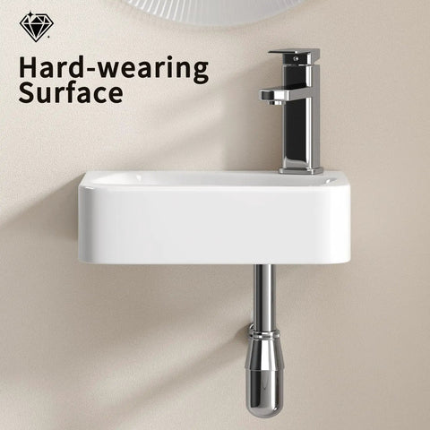HAOCHRYSYPH Wall-Mounted Bathroom Sink, Ceramic, Milk White, 14x10 in. close-up of the hard-wearing surface and faucet.