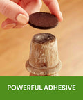 Applying felt furniture pad to chair leg, showcasing Felt Furniture Pads Pack 162 Pieces Round Brown Self Stick Protect Hardwood