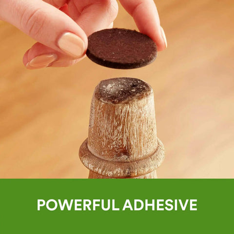 Applying felt furniture pad to chair leg, showcasing Felt Furniture Pads Pack 162 Pieces Round Brown Self Stick Protect Hardwood