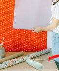 Easy Peasy Mini Paint Roller Brush With Comfy Handle For Smooth Ceiling And Cabinet Repainting Precision Edge Tool against a patterned wall.