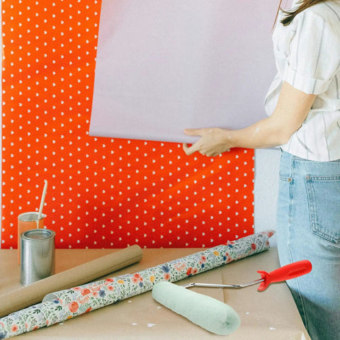 Easy Peasy Mini Paint Roller Brush With Comfy Handle For Smooth Ceiling And Cabinet Repainting Precision Edge Tool against a patterned wall.