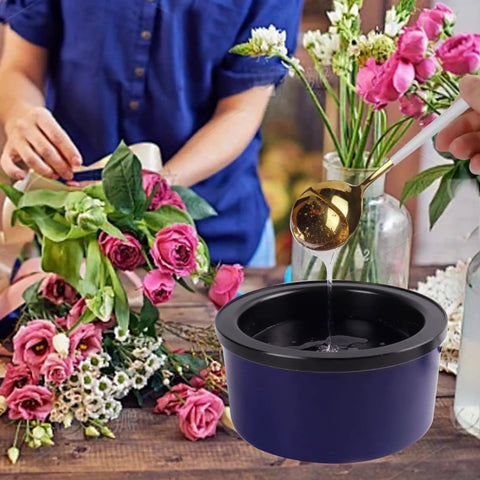 Top Shelf Premium Hot Melt Glue Pellets One Pound Pack used for floral arrangements, pouring liquid glue from a gold spoon.
