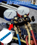 Close-up of a six way nine port aluminum air manifold block for one quarter inch quick connects, inline pneumatic splitter in use.