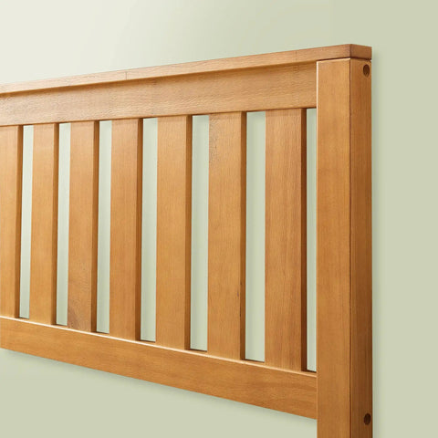 Detail of solid wood slats on the headboard of Top Tier Queen Platform Bed Frame With Tufted Fabric Headboard.
