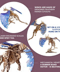 Windstorm Dragon Model Kit 3D Mechanical Puzzle With Rubber Band Motor For Adults To Build Fun Brain Teaser Hobby Kit That Lets The Wings And Body Animate In Realistic Flight Motion. 3D wooden dragon model with blue paper wings, laser-engraved scales and spiky tail