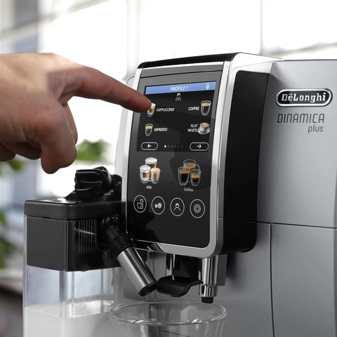 Dinamica Plus Fully Automatic Espresso Machine With Built In Grinder And Auto Milk Frother, touchscreen display in use.