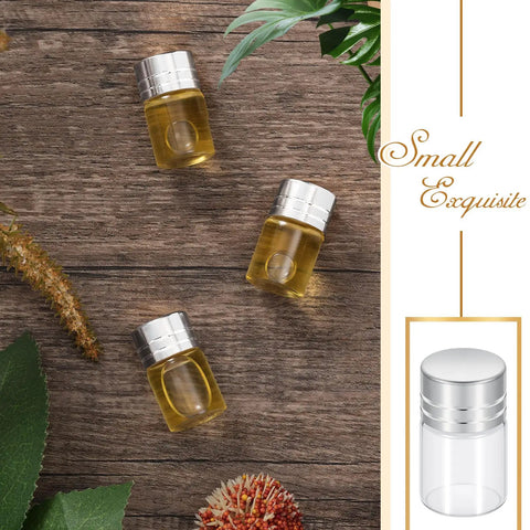 Grab This Top Shelf Haul Of Clear Two Milliliter Mini Glass Vials With Heavy Duty Silver Caps For Travel Cosmetics Diy Builds And Tight Sealing Essential Oil Storage With A Killer Natural Vibe, showcasing three 2ml vials with silver caps.