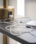 Close-up of USB port on Brass Finish USB Floor Lamp With Built In Tray And USB Port For Easy Charging Tall Standing Light.