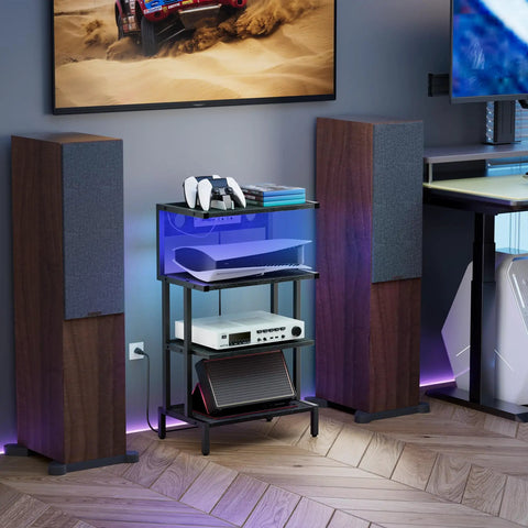 Four Tier Gaming Console Stand With Outlet And USB Ports, RGB Light Strips, compact design between speakers, media rack setup
