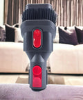2-In-1 Vacuum Tool Attachment For Gen5 Through V7 Vacuums, Wide Nozzle And Soft Bristle Brush in a living room setting