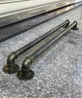 Vintage Bronze Metal Handrail Kit Indoor Outdoor Deck Railing System with two pipes and base brackets on a flat surface.