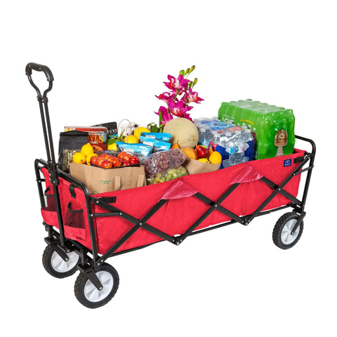 Extended Collapsible Folding Outdoor Utility Wagon With Large Capacity 46 Inch Long By 17.5 Inch Wide By 10.5 Inch High Quick Setup No Assembly Red Perfect For Camping, Beach, Markets And Hauling Gear, Yard Work And Tailgating filled with groceries and drinks.