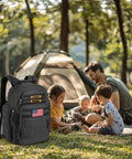 Military Style Dad Diaper Backpack With Changing Pad For Travel And Camping Trips Large Black Baby Bag In Park