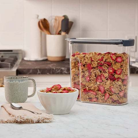 Clear 32oz Cereal Storage Container With Airtight Seal, Shatterproof Tritan, BPA Free, filled with cereal on kitchen counter