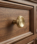 10 Pack Champagne Bronze Cabinet Knobs, 1.4 Inch Round Cabinet Pulls on wooden drawer.