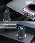 MFi Certified Dual USB Car Charger With 12W Fast Charge, connected to iPhone, features soft blue LED and braided lightning cables