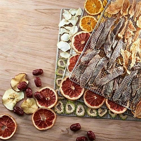 Dried fruit and jerky arranged on trays from Six Layer Stainless Steel Food Dehydrator And Fruit Dryer Machine.