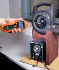 Mini Laser Photo Tachometer RPM Counter reads 2388 on easy read LCD, measuring fan RPM with no contact measurement.