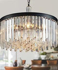 Lit Contemporary Round K9 Crystal Chandelier With 6 Lights Ultra Luxe Modern Dining Room Pendant For Kitchen And Living Areas Sleek Black Finish UL Listed hanging in a dining room.
