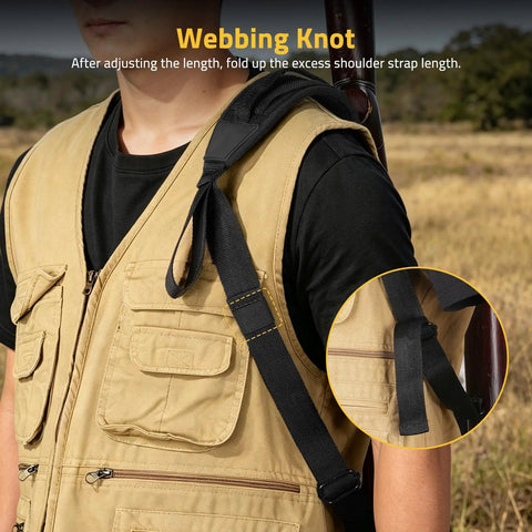Person wearing tan vest with Two Point Shotgun Sling With 6 Shell Holders For 20 Gauge, showing non-slip shoulder pad and strap detail.