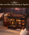 Hands assembling DIY Book Nook Kit For Adults And Teens 3D Wooden Miniature Dollhouse Puzzle With LED Light Tiny House Model