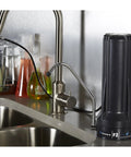 Compact Countertop Water Filter System With Three Stage Filtration Removes Fluoride Chlorine And Other Chemicals Up To 93 Percent 500 Gallon Replaceable Cartridge Easy Install Space Saving Kitchen Upgrade on sink
