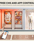 65 Inch Floor Standing Digital Signage 4K UHD Display Android 14 showing sale promotions in a shop window.