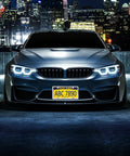 Car showcasing Stainless Steel License Plate Screws Kit with M6x20mm hardware for front mount, in a nighttime city setting.