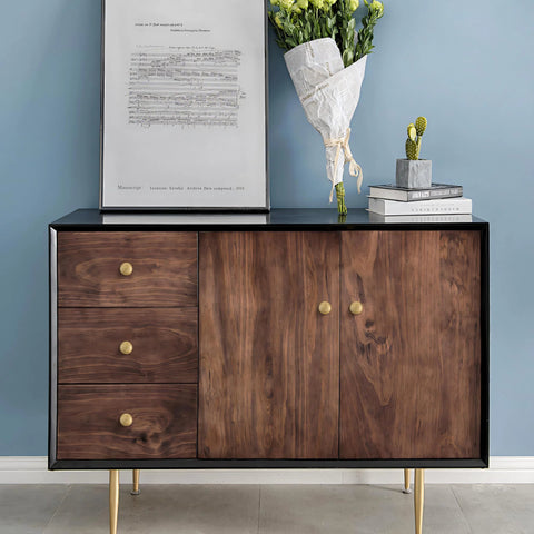 Cabinet with Brushed Gold Solid Brass Cabinet Knobs in modern room setting, featuring drawers and doors, 5 Pack 1.18 Inch Diameter.