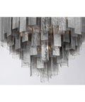 Top Shelf 15 Light Pendant Fixture Featuring Authentic Legacy Brass Finishes And Hand Crafted Grey Smoke Glass, close-up of grey smoke glass design.