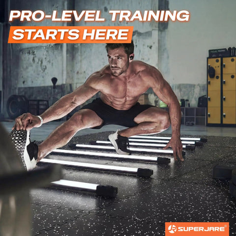 Man performing agility exercise on black gym floor with Thick 0.56 Inch Interlocking Gym Flooring Mats With Rubber Top For Home Gym