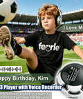 Kid wearing headphones and soccer ball MP3 player on neck; Kid Friendly Soccer Ball MP3 Player With 64GB Storage And Bluetooth 5.0 Built In Speaker FM Radio Recording Pedometer Includes Headphones And Lanyard Perfect Gift For Soccer Fans On Match Day