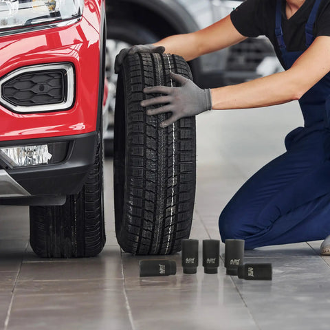 Mechanic using 1/2 Inch Drive 6-Point Go-To Thin Wall Axle Nut Socket Set 9-Piece Metric Kit for hub nut work on car
