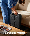 Person lifting the Grab And Go 101 Piece 8V Cordless Drill Set with USB C Recharge stored in portable black case