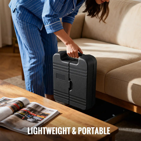 Person lifting the Grab And Go 101 Piece 8V Cordless Drill Set with USB C Recharge stored in portable black case