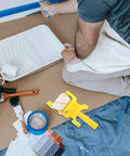 Smooth As Glass Paint Edger Roller Kit With Extra Sleeve For Crisp Wall Edges And Zero Paint Runoff Heavy Duty Handheld Painting Gear on a workspace.