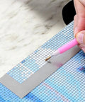 Diamond Painting Ruler With 1020 Blank Grids And Diamond Mesh Alignment Tool for 5D Diamond Art DIY Craft Accessories in use.