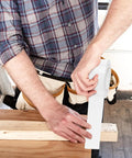 Man using White Duct Tape Heavy Duty Waterproof 40 Yards By 2 Inches 9 Mils Thick With Strong Adhesive No Residue Easy Tear By Hand