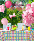 Party setup with Pink Bow Balloons Kit includes 30 pieces of 12 inch balloons in hot pink rose dots and confetti styles plus two big foil bow balloons.