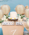 12 Sets Burlap Paper Lanterns and Wooden Centerpieces Kit for Baby Shower and Wedding Decor displayed on a table