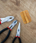 Brass Hinges For Wooden Boxes And Furniture Self Closing Cabinet Hardware Kit with pliers on wooden surface