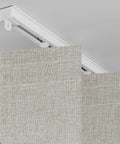 100 Percent Blackout Accordion Door Curtain For Sliding Glass Doors, cream white fabric, mounted on track, close-up view