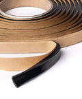 Close-up of Durable Pro Grade Butyl Sealant Tape, 20 ft roll, 1/2 in wide, 1/4 in thick, for Auto RV Marine and Window Glazing use