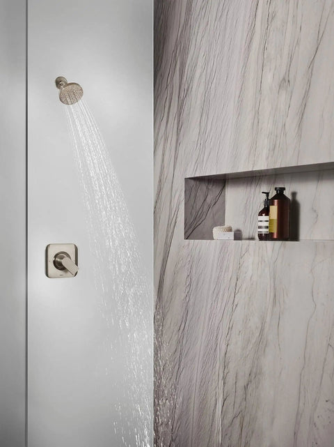 Brushed Nickel Six-Function 4.5-Inch Shower Head With 1.75 GPM Eco-Performance Spray installed in a modern shower.