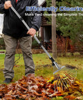 Person raking leaves with an Adjustable Metal Leaf Rake With Telescoping Handle For Lawn And Garden Cleanup Lightweight Yet Heavy Duty Yard Rake For Grass Leaves And Shrubs Reaches From 17.7 To 83.5 Inches And Is Great For Adults Women And Kids.