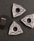 20Pcs Bronze Carbide Turning Inserts WNMG 432 080408 Pro-Grade For Lathe Cutting Tools, PVD Coated, front view on black surface