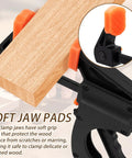 5 Pack 4 Inch One Handed Bar Clamps For Woodworking Quick Change F Clamp Set For Gluing Drilling Sawing And Securing Carpentry And DIY Projects With Soft Jaw Pads To Protect Wood Surfaces, close-up on wood