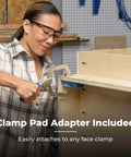 Portable Pocket Hole Jig System With Adjustable Position Sliders And Clamp Adapter For Materials Half Inch To One And A Half Inches Thick Lets You Make Strong Joints At Multiple Angles For Quick Pro Level Woodworking Projects in use by a woman on plywood with clamp pad adapter included.