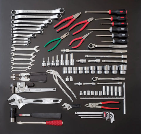 Overhead view of TSX950BK 86-Piece Tool Set with wrenches, pliers, screwdrivers, and sockets, displayed in matte black case.