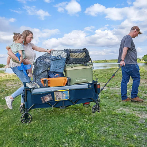 Family using Extended 51 Inch Collapsible Wagon Cart With 500 Lb Load Capacity And 400L Storage in a grassy outdoor setting